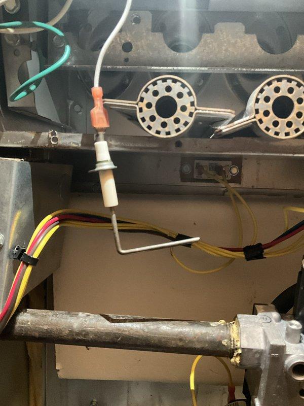 Completed comprehensive BFMA tune-up service on a 16+ year old gas furnace system. Performed thorough inspection of burner assembly, ignition system, and gas valve components, verifying proper operation of all heating elements and flame sensors. Inspected and tested Honeywell Home Wi-Fi thermostat, confirming accurate temperature readings and proper communication with heating system, with unit currently set to maintain 79 degrees in heating mode.