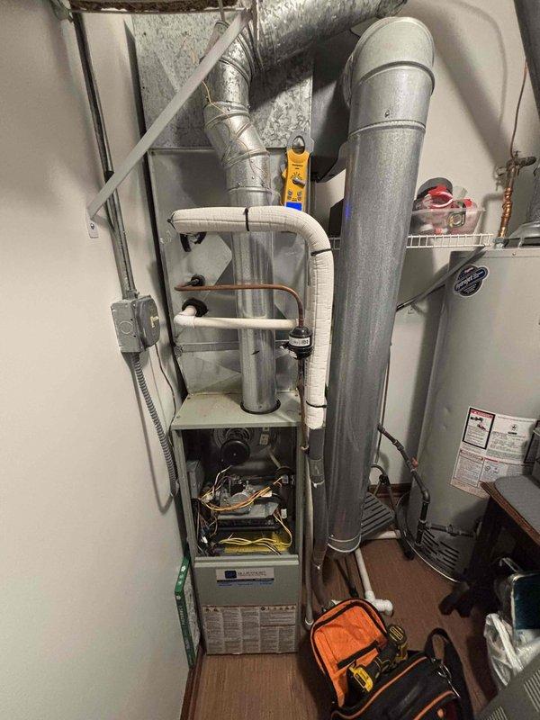 Completed comprehensive BFMA tune-up service on 13-year-old residential furnace and humidifier system. Performed furnace maintenance including inspection of heat exchanger, burner assembly, and blower components, verified proper airflow through ductwork, and tested all safety controls. Replaced #10 humidifier pad, inspected condensate drainage system including PVC piping, and confirmed all mechanical and electrical systems operating within manufacturer specifications.