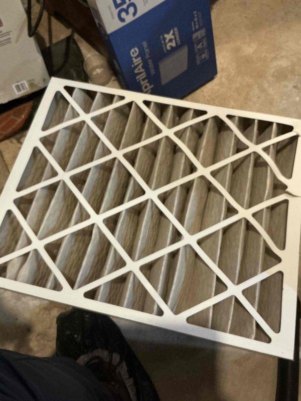 Completed comprehensive BFMA tune-up on 11-year-old HVAC system including furnace maintenance, humidifier service with #35 pad replacement, and semi-annual filter change with 20x25x5 filter. Inspected Healthy Climate humidifier unit, verified proper operation, replaced humidifier pad, and checked water supply connections and drainage. Installed new pleated air filter, performed furnace safety and operational checks, and confirmed all system components functioning properly within manufacturer specifications.