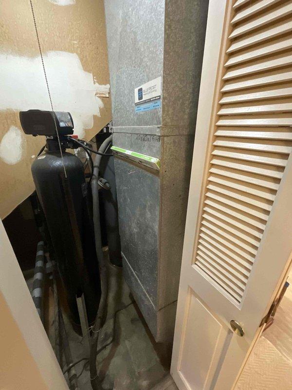 Responded to no-heat call and diagnosed cracked heat exchanger requiring immediate furnace replacement. Provided comprehensive estimate for new air handler installation in utility closet, including proper ductwork connections, condensate pump integration, and system sizing evaluation. Documented existing equipment configuration and measured space constraints to ensure proper equipment selection and comfort system design for the home.