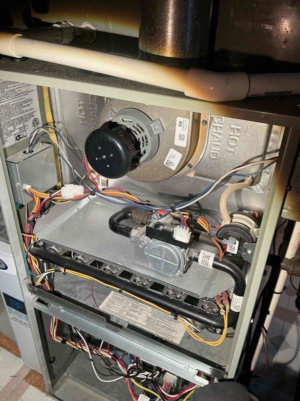 Completed comprehensive BFMA tune-up service on 8-year-old furnace system including humidifier maintenance. Performed full inspection of blower motor assembly, gas burner components, control module, and all electrical connections. Verified proper operation of gas valve, checked all wire harnesses and connectors for secure attachment, and confirmed condensate drain lines were clear and functioning correctly.