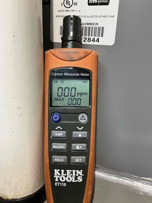 Completed comprehensive BFMA tune-up service on 1-year-old HVAC system including furnace inspection, humidifier service with #35 pad replacement, dryer vent cleaning, and semi-annual filter change #213. Performed carbon monoxide testing using calibrated Klein Tools ET110 meter, confirming safe 0 ppm readings at heat pump unit. Removed and cleaned heavily soiled humidifier frame showing significant mineral buildup and discoloration, restoring proper operation for optimal humidity control during heating season.