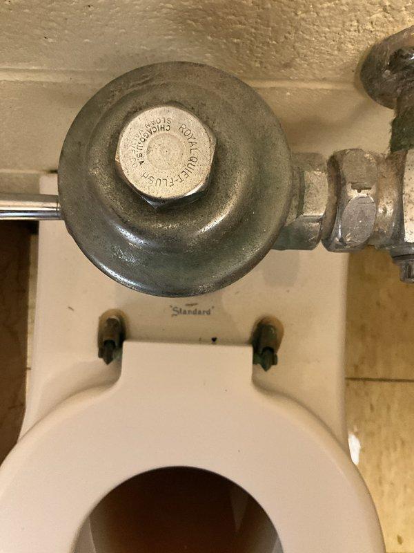 Responded to utility company report of continuous water consumption at 40 gallons per hour at church facility. Inspected toilet valve assembly where staff had attempted unsuccessful adjustment of shutoff mechanism. Replaced faulty toilet fill valve and shutoff assembly to eliminate constant water flow, restoring proper operation and stopping excessive water waste.