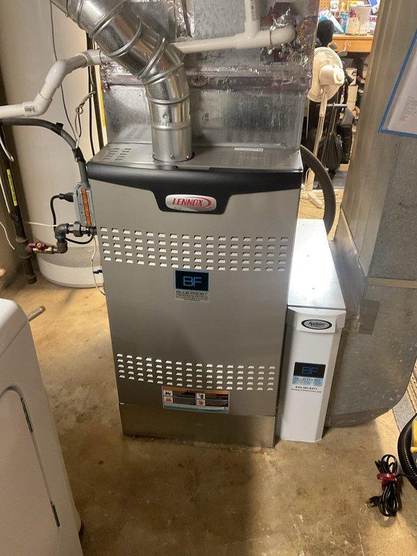 Completed comprehensive furnace tune-up on Lennox gas heating system aged 2+ years. Performed standard maintenance protocol including inspection of burner assembly with confirmation of proper blue flame ignition pattern, verified all electrical connections and wiring harnesses, checked gas valve operation, inspected heat exchanger, tested safety controls, and evaluated overall system performance. Unit operating within manufacturer specifications with no deficiencies noted; system returned to service in optimal condition.