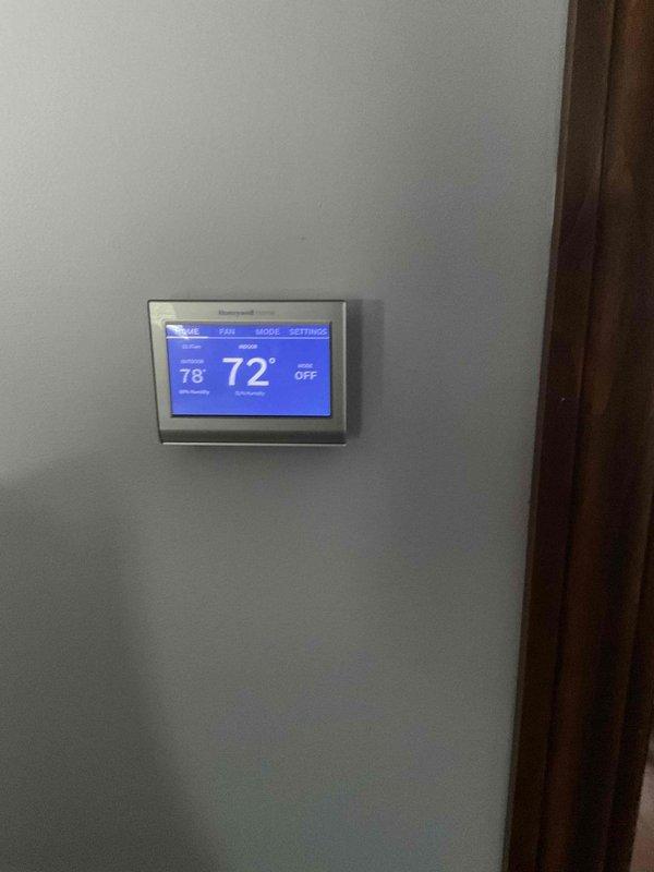 Conducted on-site assessment of 22-year-old Lennox oil furnace located in crawl space with active oil leak. Evaluated existing equipment condition, documented current thermostat setup, and provided replacement furnace estimate to client ready to proceed with new system installation.