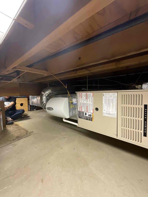 Conducted on-site assessment of 22-year-old Lennox oil furnace located in crawl space with active oil leak. Evaluated existing equipment condition, documented current thermostat setup, and provided replacement furnace estimate to client ready to proceed with new system installation.
