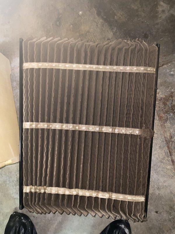 Completed comprehensive BFMA tune-up service on 6-year-old HVAC system including furnace maintenance, tanked water heater service, and semi-annual filter replacement. Replaced heavily soiled 16x25x5 pleated air filter that showed significant dust and debris accumulation, which was restricting proper airflow. Performed full system inspection and tune-up procedures on both heating equipment and water heater to ensure optimal performance and efficiency for the upcoming season.
