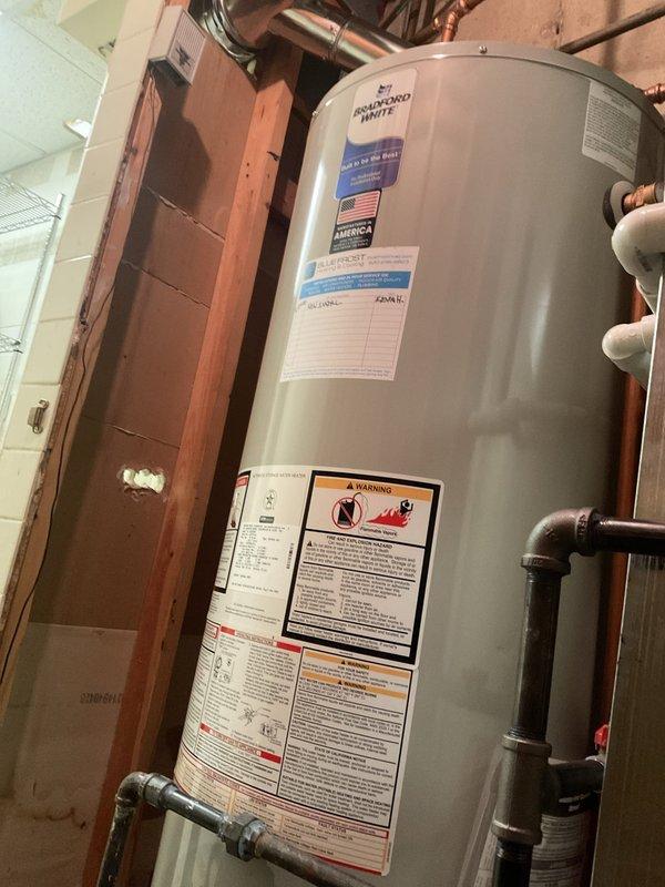 Responded to complaint of excessive noise occurring when blower shuts down on recently installed furnace system (2 months old). Performed comprehensive BFMA tune-up including full system inspection, verified proper operation of blower motor and housing assembly, checked flame sensor positioning and functionality, and inspected all mechanical and electrical components. Confirmed all safety controls operating within manufacturer specifications, verified proper airflow and combustion parameters, and documented system conditions with photos for service records.