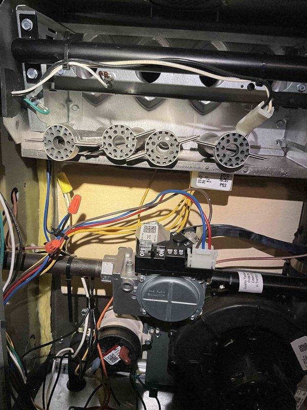 Completed comprehensive BFMA tune-up service on 10+ year old furnace system during morning appointment window. Performed full system inspection including heat exchanger evaluation, gas valve assembly verification, electrical component testing with temperature sensors, and blower motor assessment. All wiring connections, safety controls, and mechanical components inspected and found operating within normal parameters; humidifier service included in maintenance protocol.