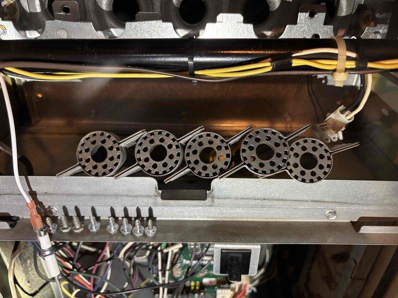 Completed comprehensive BFMA tune-up on 18+ year old Bryant furnace system as first service stop of the day. Performed full inspection of burner assembly, gas manifold, ignition system, and all electrical connections; verified proper operation of all five burners and confirmed flame characteristics. All components found to be functioning within manufacturer specifications, with system demonstrating satisfactory performance despite age of equipment.