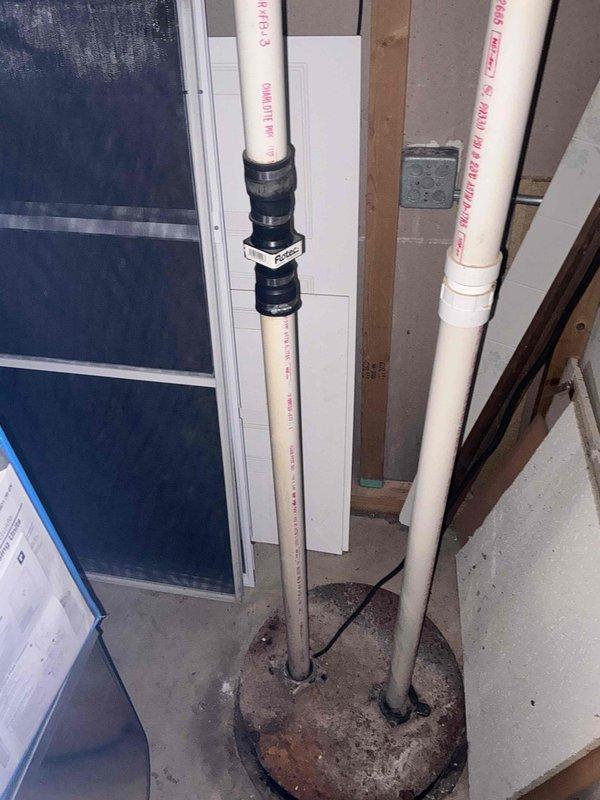 Performed a complete tune-up on a 4+ year-old furnace, including inspection of the control compartment, ignition components, and control board wiring, with connections verified secure and cabinet interior assessed for dirt and staining. Inspected the condensate/venting PVC piping, rubber coupling and clamps, and cleanout fitting, noting heavy corrosion on the adjacent basin cover. Equipment was left operating properly.