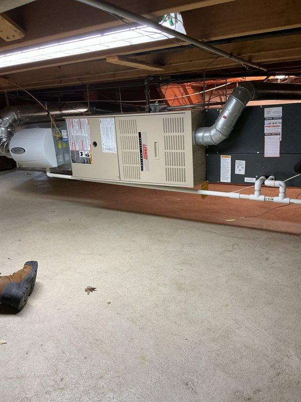 Installed a new Lennox SL280UH090V36K 90,000 BTU horizontal gas furnace in a crawl space, connecting it to the existing coil cabinet, humidifier, PVC condensate drain, and flue venting. Reinstalled and verified thermostat operation, and completed the installation under a customer-obtained permit.