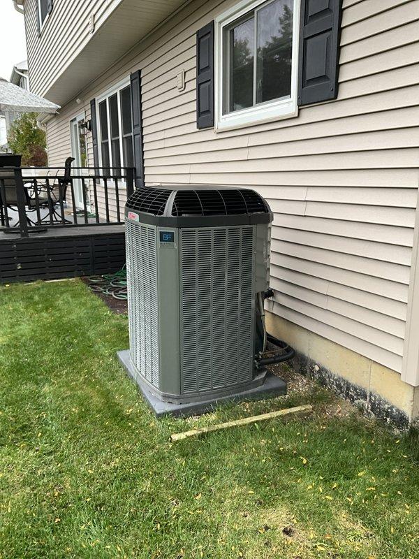 Performed a seasonal heating tune-up on a 6-year-old Trane gas furnace, inspecting the cabinet, flue piping, PVC condensate/vent lines, gas piping, and relay panel connections. Verified the equipment was clean and free of visible rust, frost, or damage, and confirmed proper operation, with no deficiencies noted. Also inspected the outdoor condenser unit and pad, finding the unit clean with refrigerant lines and conduit intact.