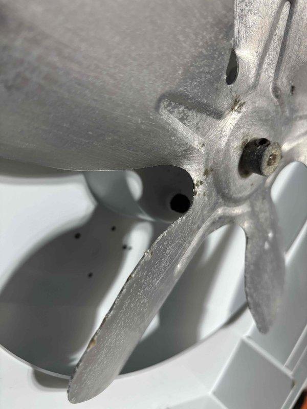 Performed a complete furnace tune-up, including inspection of the blower and fan assembly and the humidifier. Noted dust buildup, oxidation, and light rust on the fan blades and hub, along with debris on the housing ledge, and cleaned the components to restore proper airflow and operation. Verified the system was running safely and efficiently at completion.