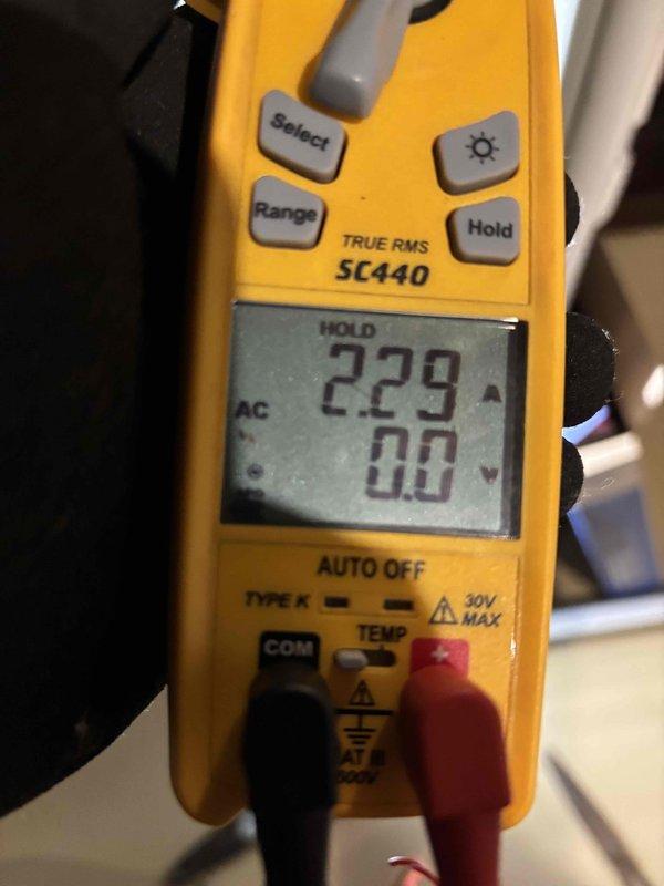 Performed a seasonal AC tune-up on a 4-year-old system, including electrical diagnostics of the outdoor unit with a True RMS clamp meter. Measured component amperage draw (2.29 A) and verified capacitor capacitance (46.23 µF) to confirm proper motor and capacitor operation. System tested within normal operating parameters at completion.