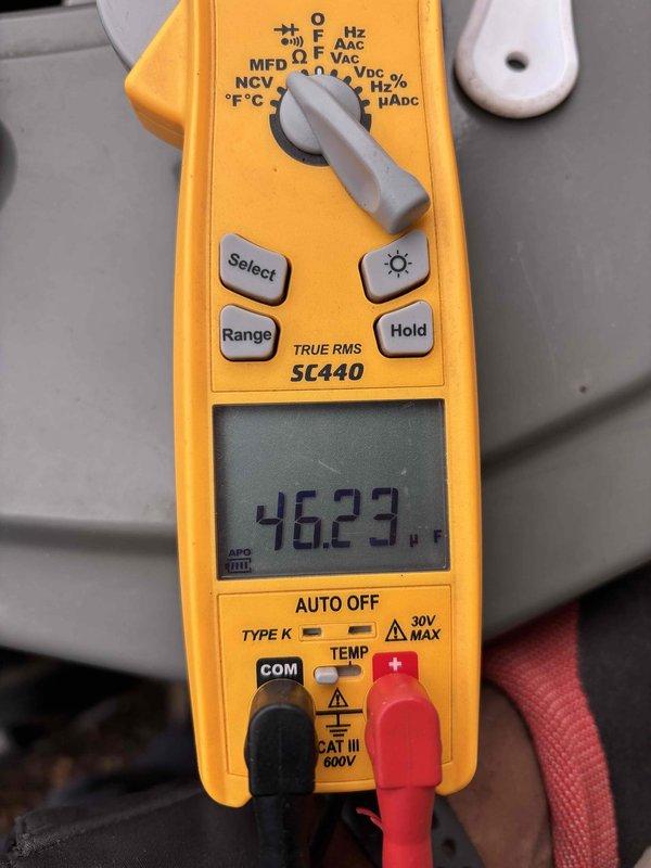 Performed a seasonal AC tune-up on a 4-year-old system, including electrical diagnostics of the outdoor unit with a True RMS clamp meter. Measured component amperage draw (2.29 A) and verified capacitor capacitance (46.23 µF) to confirm proper motor and capacitor operation. System tested within normal operating parameters at completion.