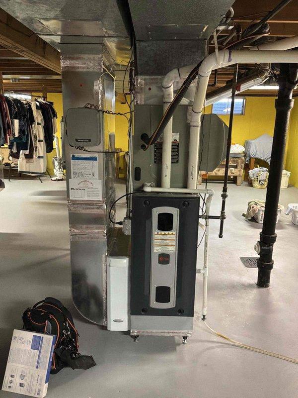 Performed a complete tune-up on the 8-year-old gas furnace, including inspection and cleaning of the burner assembly to remove heat-related oxidation and debris, and verified proper combustion, condensate drainage, and ductwork connections. Serviced the humidifier and confirmed all components were operating correctly, with no visible leaks, corrosion, or damage to the equipment.