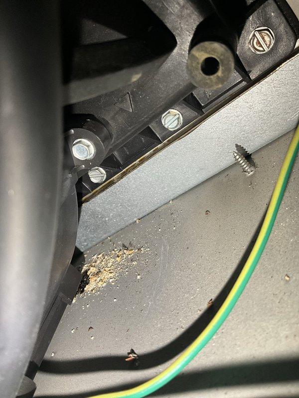 Responded to a gas-company-tagged furnace and inspected the unit following a reported gas odor. The inducer housing was found with heavy corrosion at the opening and failed sealant, with rust and debris in the cabinet. The corroded inducer assembly was serviced and resealed, the cabinet was cleaned, and the system was restored to safe, operational condition with heat returned.