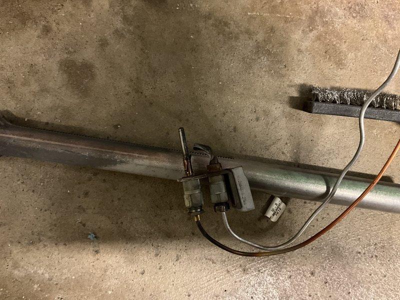 Diagnosed a failed gas valve and quoted replacement; part to be staged for installation. Removed the burner and pilot assembly and wire-brushed it to clear oxidation and heat-related corrosion for inspection. Also observed heavy frost and ice buildup on the evaporator coil, indicating a possible airflow or refrigerant-related issue that should be addressed.