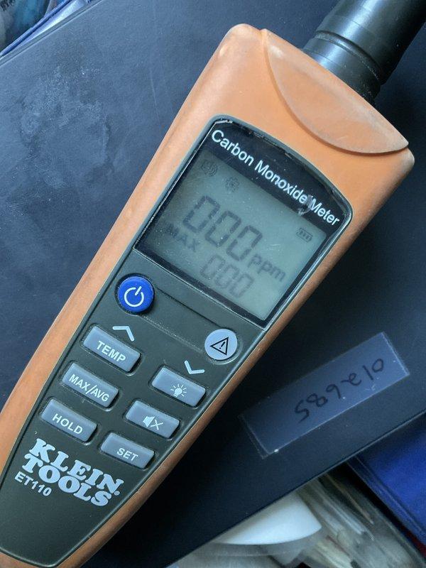 Performed a furnace tune-up on an 11+ year-old Comfortmaker horizontal furnace/air handler suspended in the attic, inspecting the cabinet, ductwork connections, and gas piping, and verifying safe operation. Carbon monoxide levels were tested with a calibrated meter and measured 0 ppm, with no abnormal readings detected.
