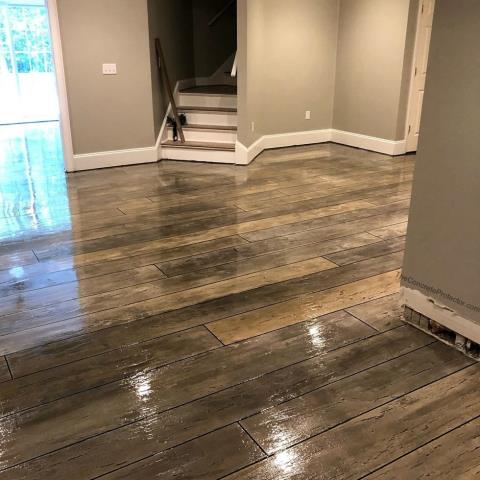 Moultrie, GA - This epoxy wood decorative concrete floor is GORGEOUS! Honestly, the perfect floor for this room! I love the realistic look and its fantastic for kids because its going to stay shiny and quality-looking for a long time! Floor Warriors knows how to make great decorative flooring! Moultrie, GA - This epoxy wood decorative concrete floor is GORGEOUS! Honestly, the perfect floor for this room! I love the realistic look and its fantastic for kids because its going to stay shiny and quality-looking for a long time! Floor Warriors knows how to make great decorative flooring!