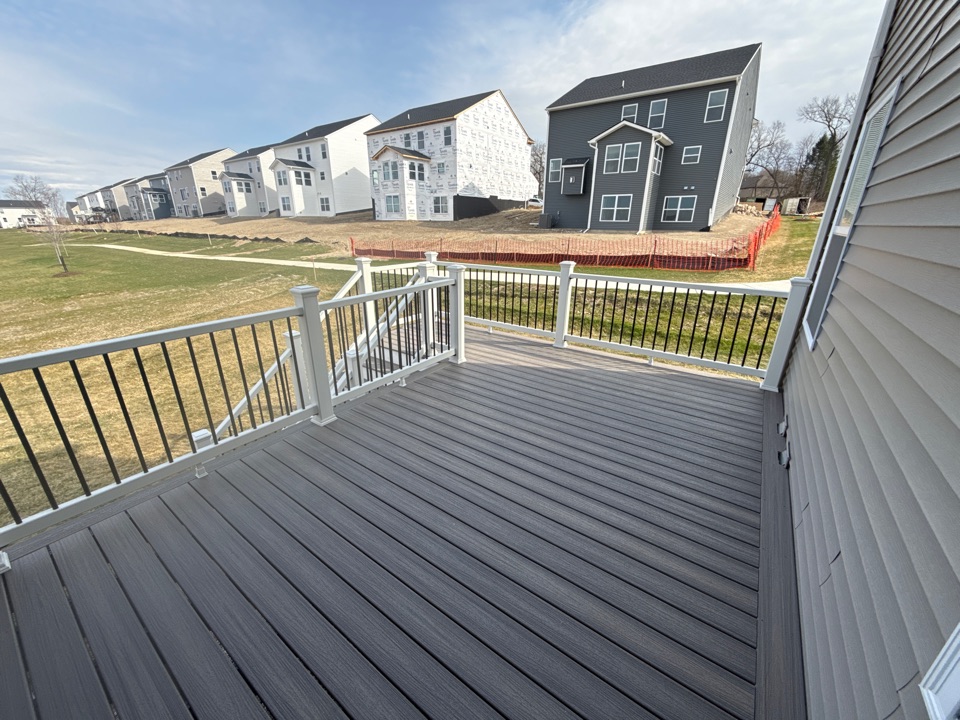 Just wrapped up this custom 220 Sq Ft Trex deck. This customer chose the popular Rocky Harbor with a white a trim to compliment their home! Another happy customer!