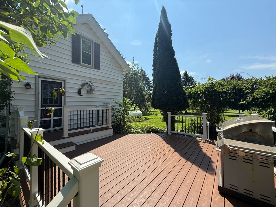 Just wrapped up this beauty. The homeowner was sick of their old rotted wood deck, so they called Down Home to build them a custom Trex deck. This deck features Trex Enhanced Basics Saddle, with a Trex Select Classic white railings. Happy to help, and glad to have another satisfied customer. 