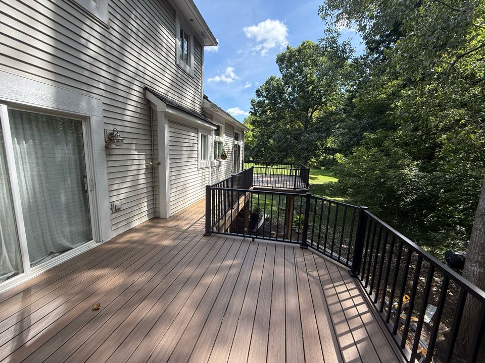 Got the final touches all set on this spacious 400 sq fr custom Trex deck. This one features Trex Enhanced Naturals Toasted Sand decking, with black Trex Signature rails. Another happy customer in books. 