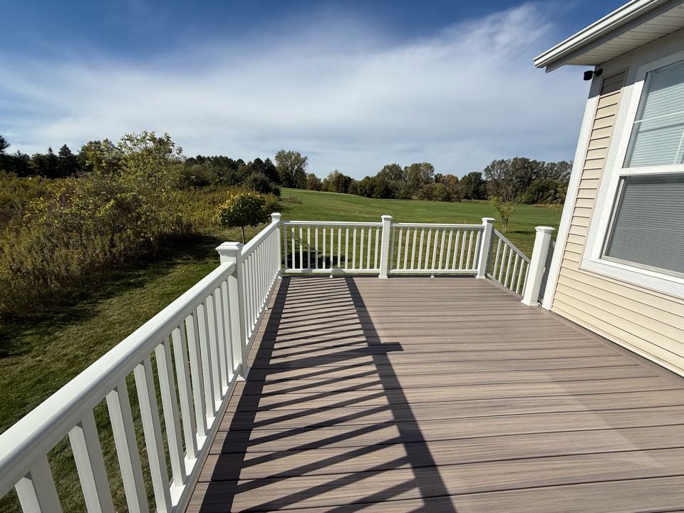 Just wrapped up this simple but stunning Trex deck in Okemos MI, over looking the finishing hole on Campus Fields Golf Course. Safe to say we have another satisfied customer. 