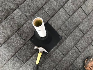 Fairfax, VA - The roof tune-up for this customer included replacing an old pipe collar, as well as resealing all flashings and nail pops and replacing shingles that were the wrong color. Fairfax, VA - The roof tune-up for this customer included replacing an old pipe collar, as well as resealing all flashings and nail pops and replacing shingles that were the wrong color.