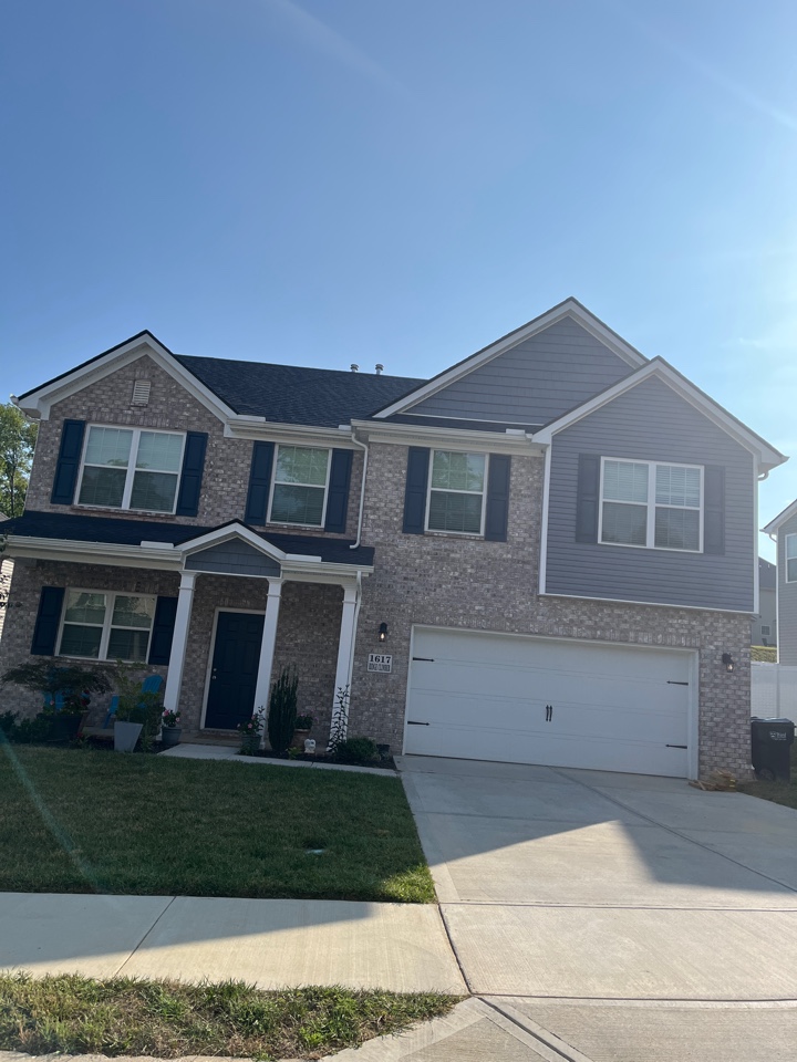 Replacing missing shingles.