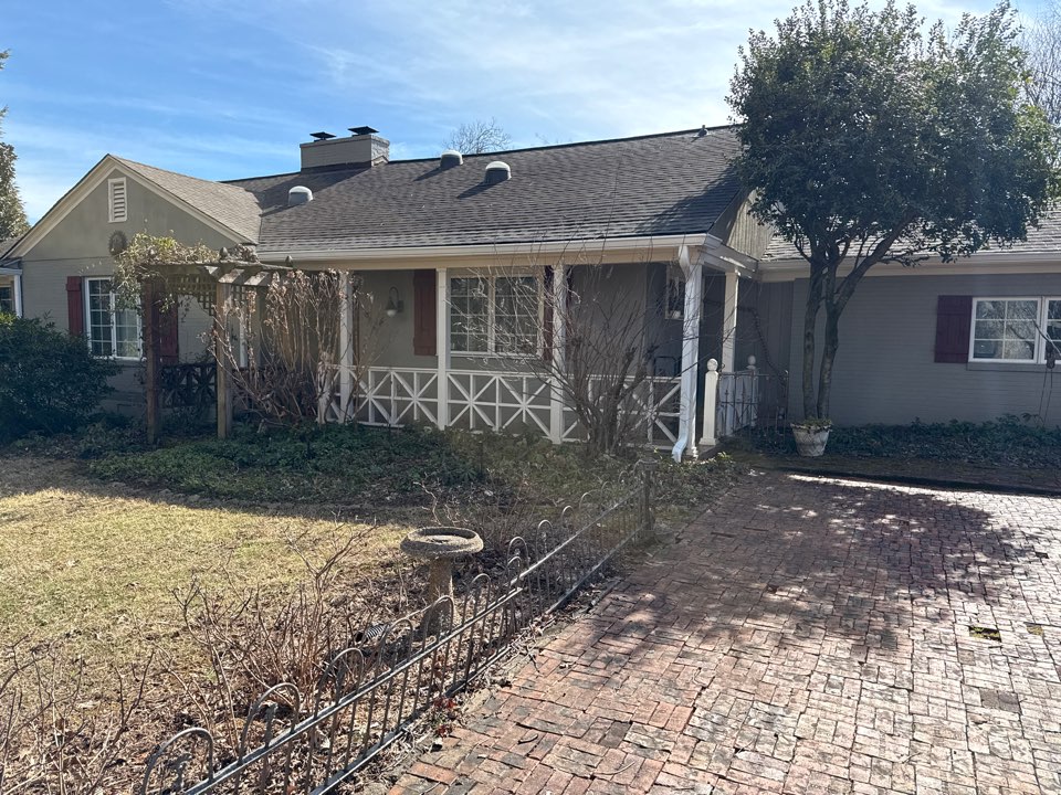 Replacing wood and shingles to repair a hole in the roof.