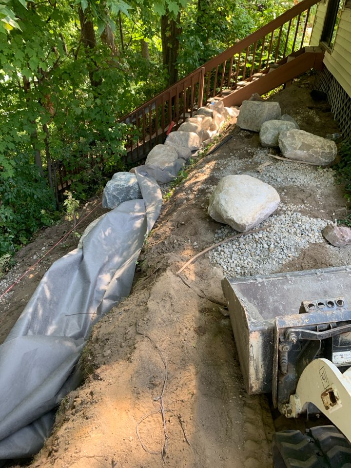 Massive boulder wall Lakeside here on Ford Lake in Ypsilanti, Michigan. Should be wrapped up in about three days.