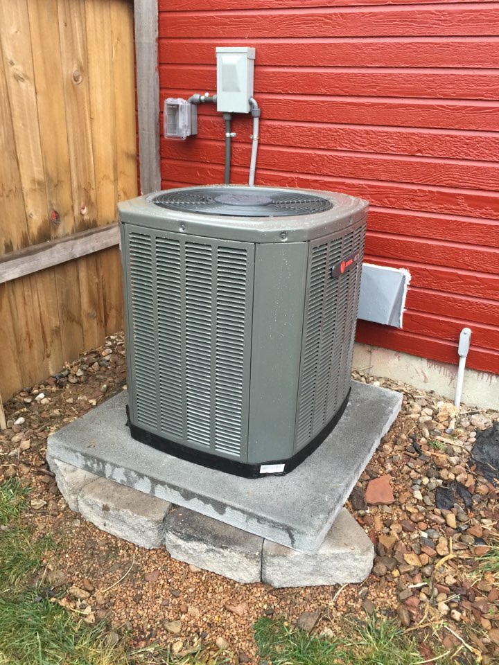 Install TRANE air conditioner.