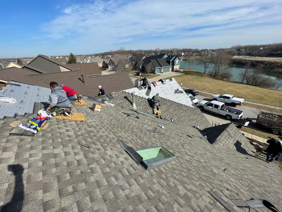 Indianapolis, IN - New roof almost completed. Indianapolis, IN - New roof almost completed.
