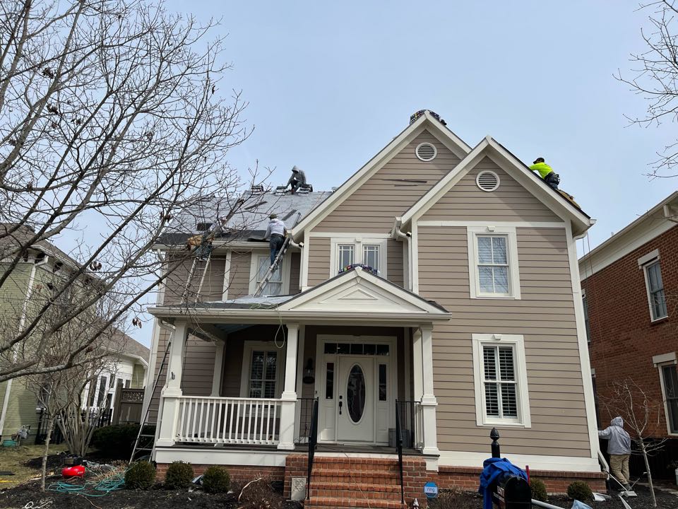 Carmel, IN - New shingles being installed Carmel, IN - New shingles being installed
