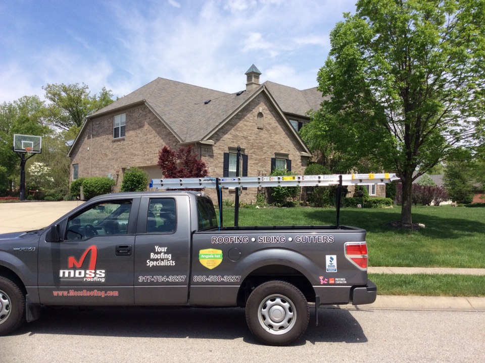 Fortville, IN - In Fortville inspecting a roof for hail damage. Fortville, IN - In Fortville inspecting a roof for hail damage.