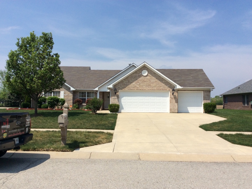 Indianapolis, IN - Inspecting roof for wind damage. Indianapolis, IN - Inspecting roof for wind damage.