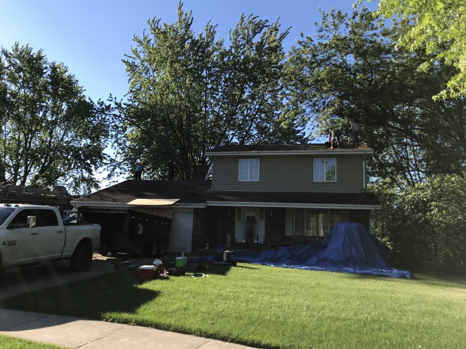 Schererville, IN - Tear off and re-roof with CertainTeed Landmark shingles and gutters. Schererville, IN - Tear off and re-roof with CertainTeed Landmark shingles and gutters.