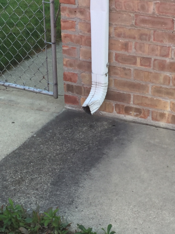 Calumet City, IL - Damaged downspout. Calumet City, IL - Damaged downspout.