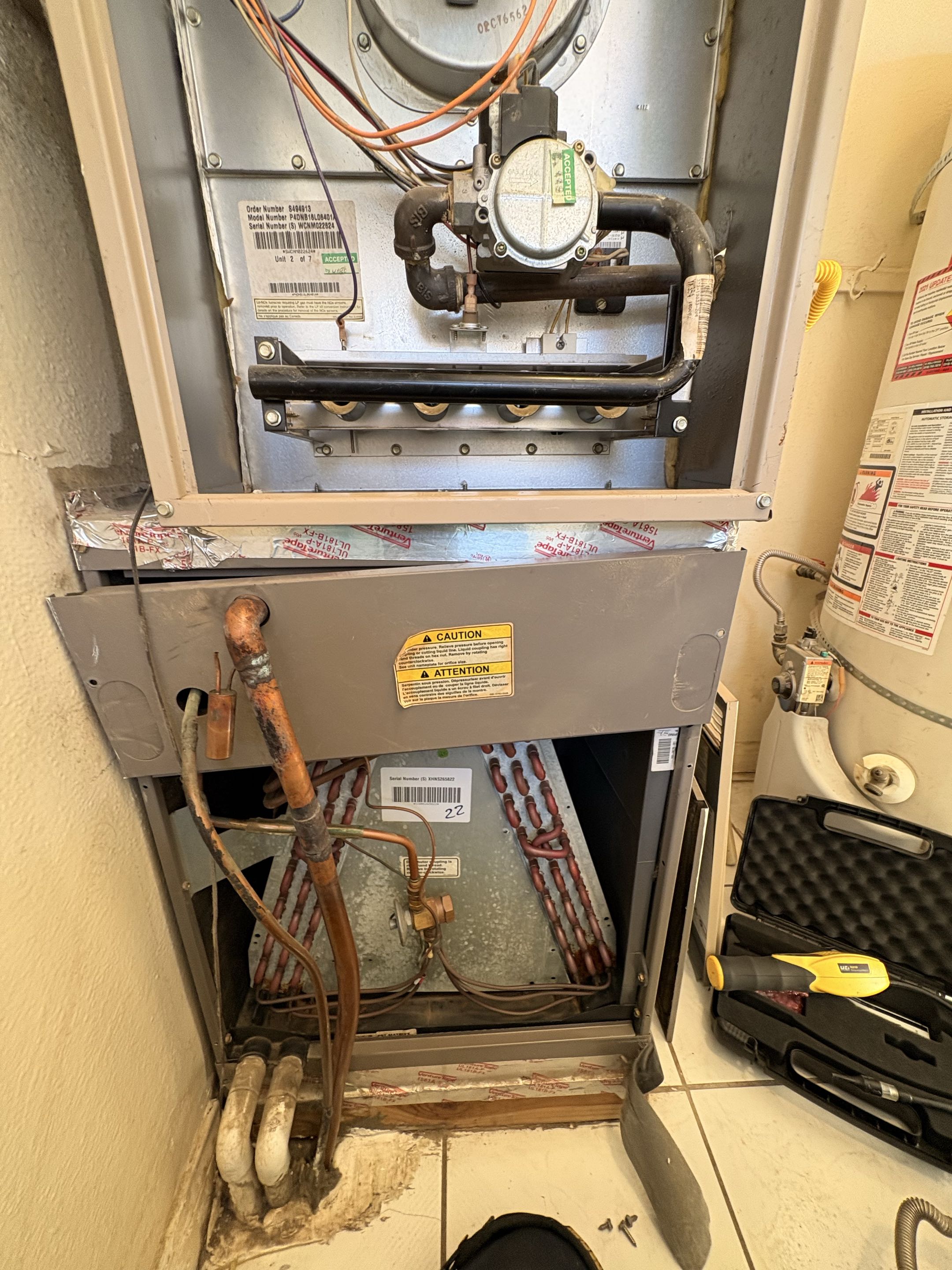 Service call. Perform check for leaks. York indoor coil down-shot refrigerant leak. Compressor terminals leak.