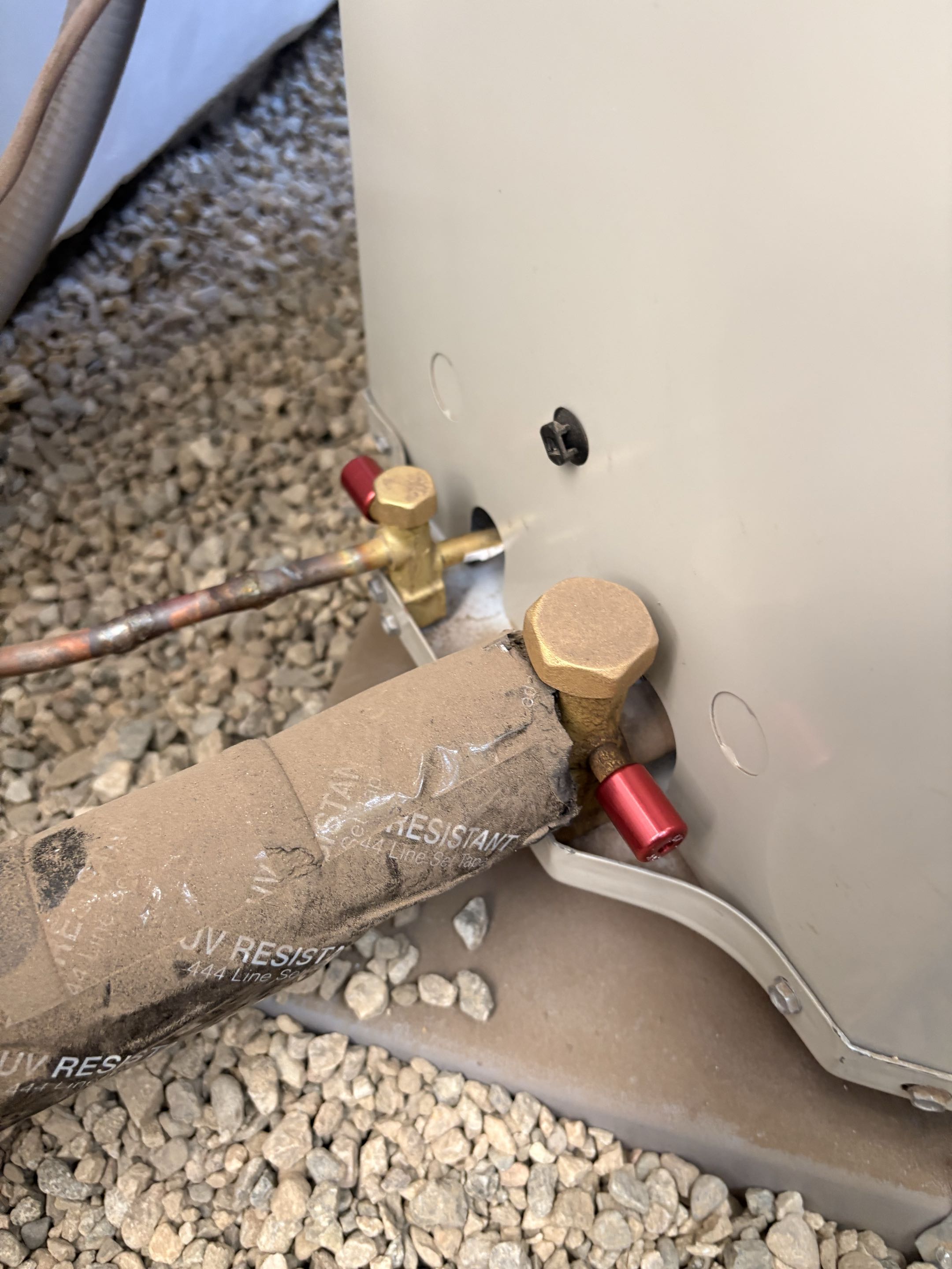 Tech service call. Install new refrigeration line set locks on condenser service ports. Payne AC unit. Service completed. 