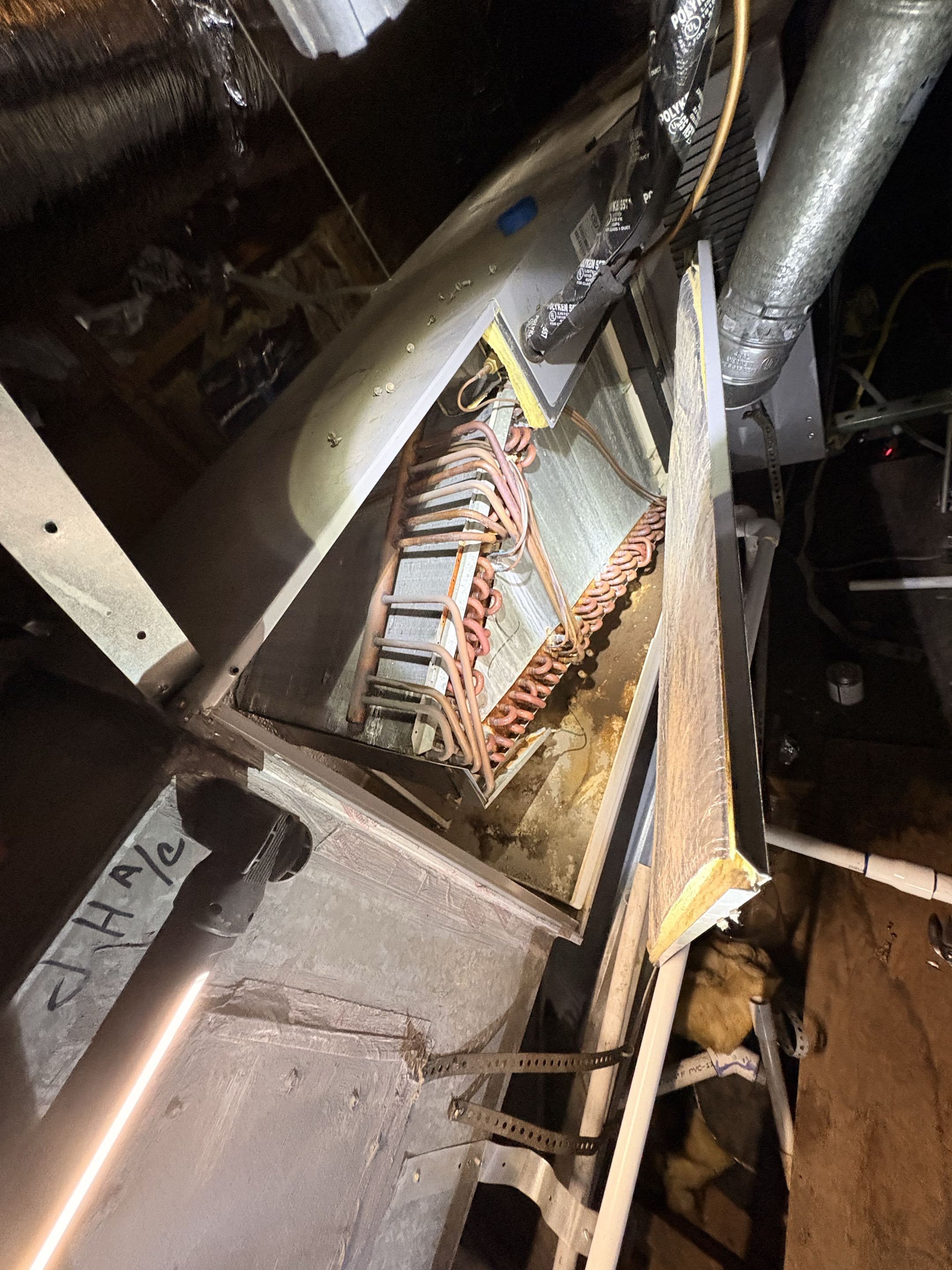 Tech call. AC water dripping thru ceiling. Perform condensation line, new PVC emergency line 