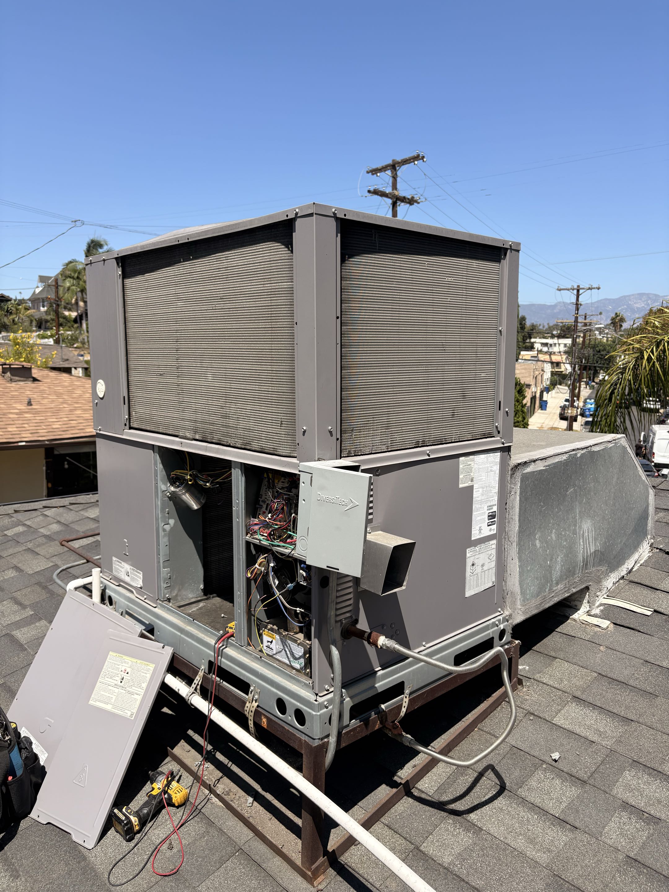 Payne package unit. Rooftop No cool. Burt smell. Perform electrical system check. 
