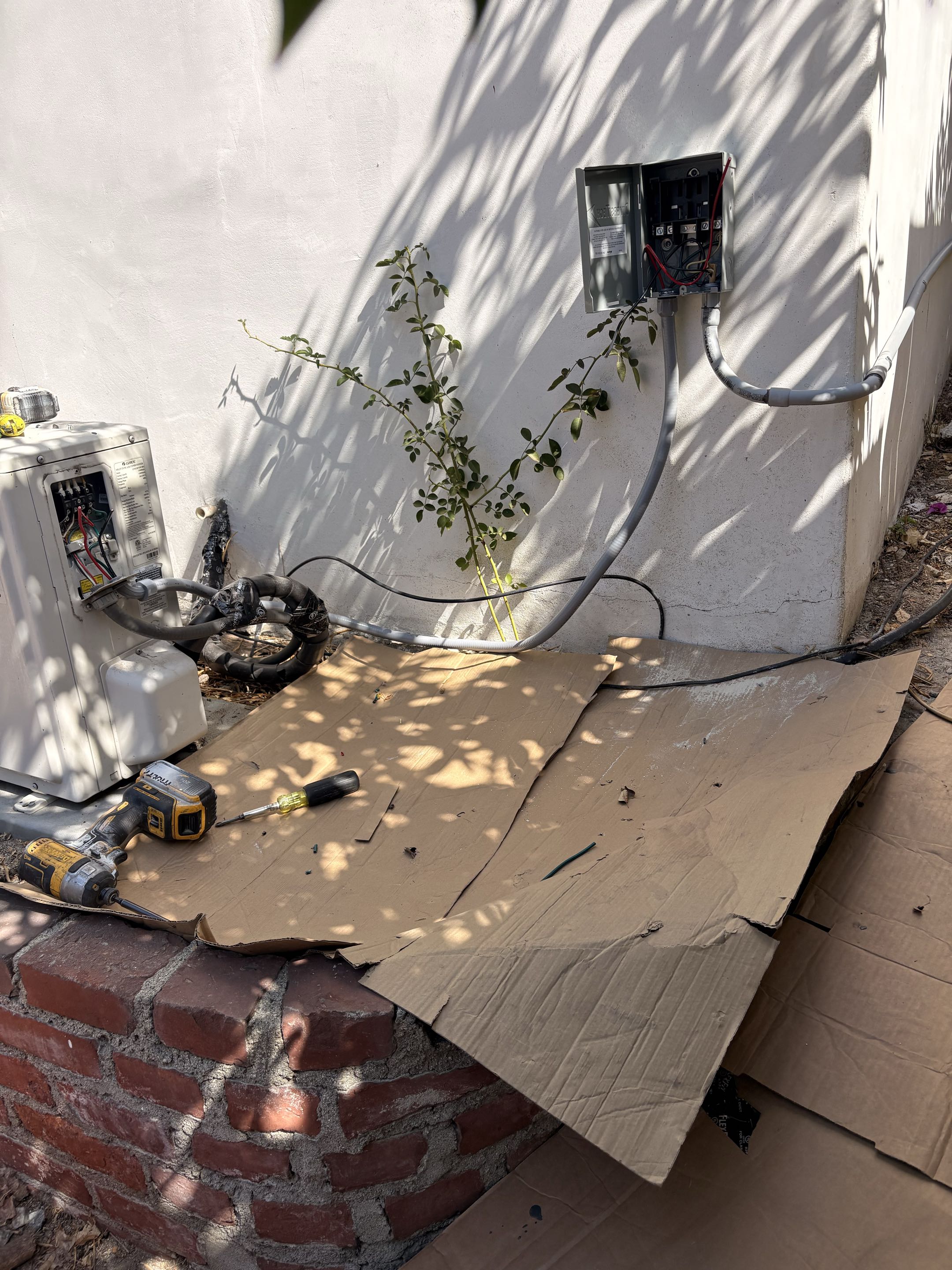 Service call. GREE Minisplit rewire correctly up to code. New electrical conduit weather proof. disconnect fuse box. 
