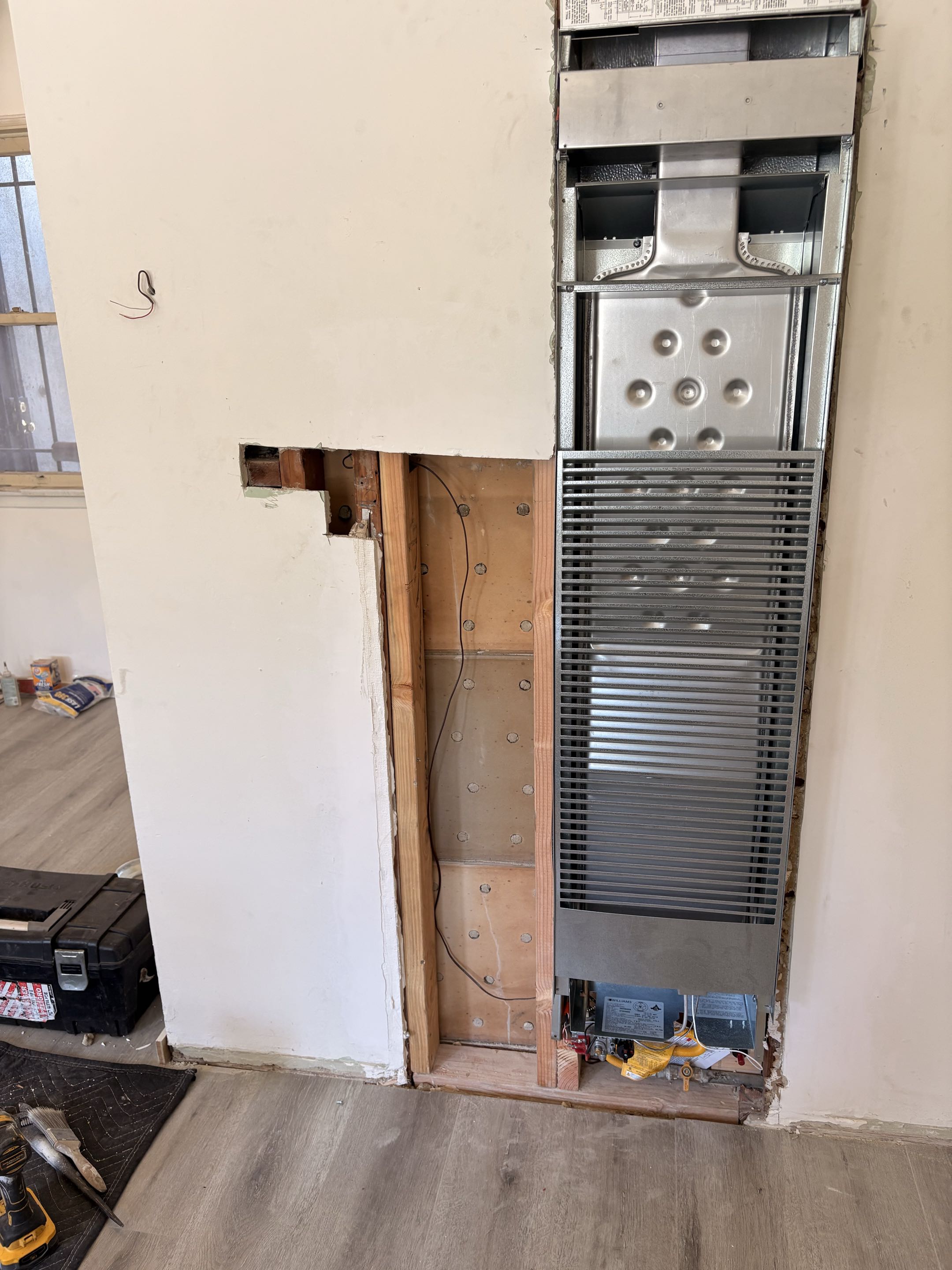 Finishing new Williams furnace installation. 