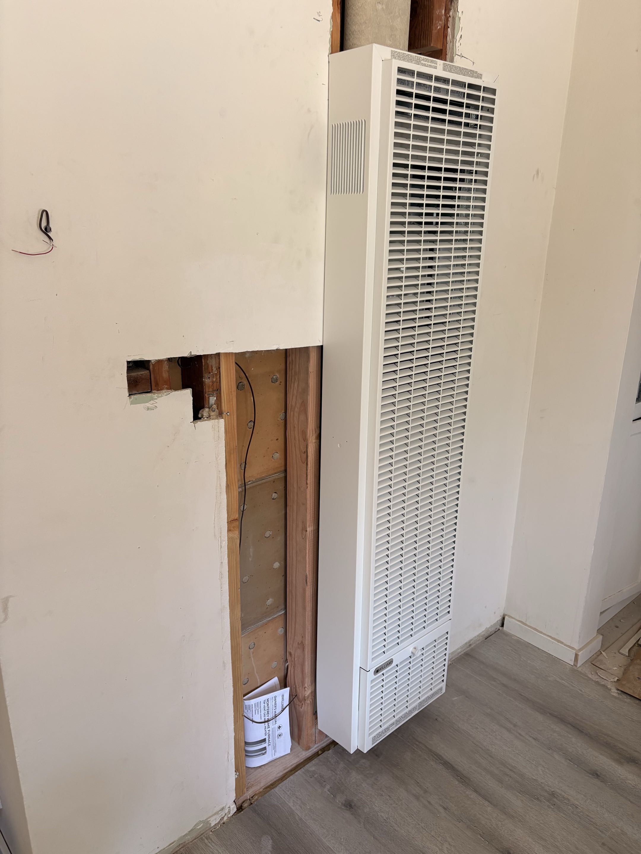 Finishing new Williams furnace installation. 