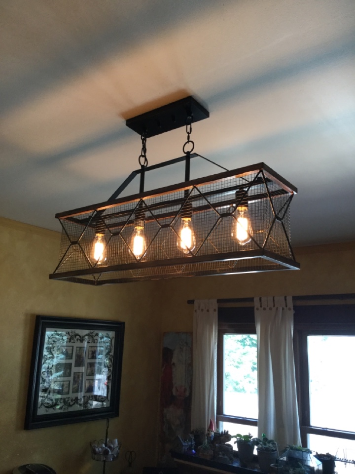 Installed new lighting fixtures throughout main level of home.