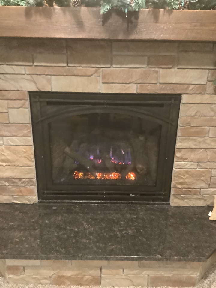 Cleaned Kozy Heat fireplace 