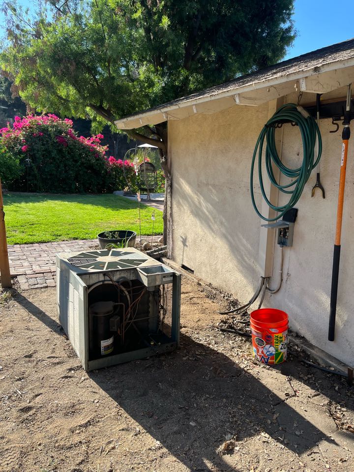 Already demoing out this split system that we are taking out because of the fires here in Altadena 